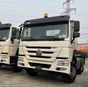 ディーゼル トラック白い色6×4ドライブ モデルWeichai使用されたエンジン430hp 12は小屋のHowoの標準的なトラクターを連動させる