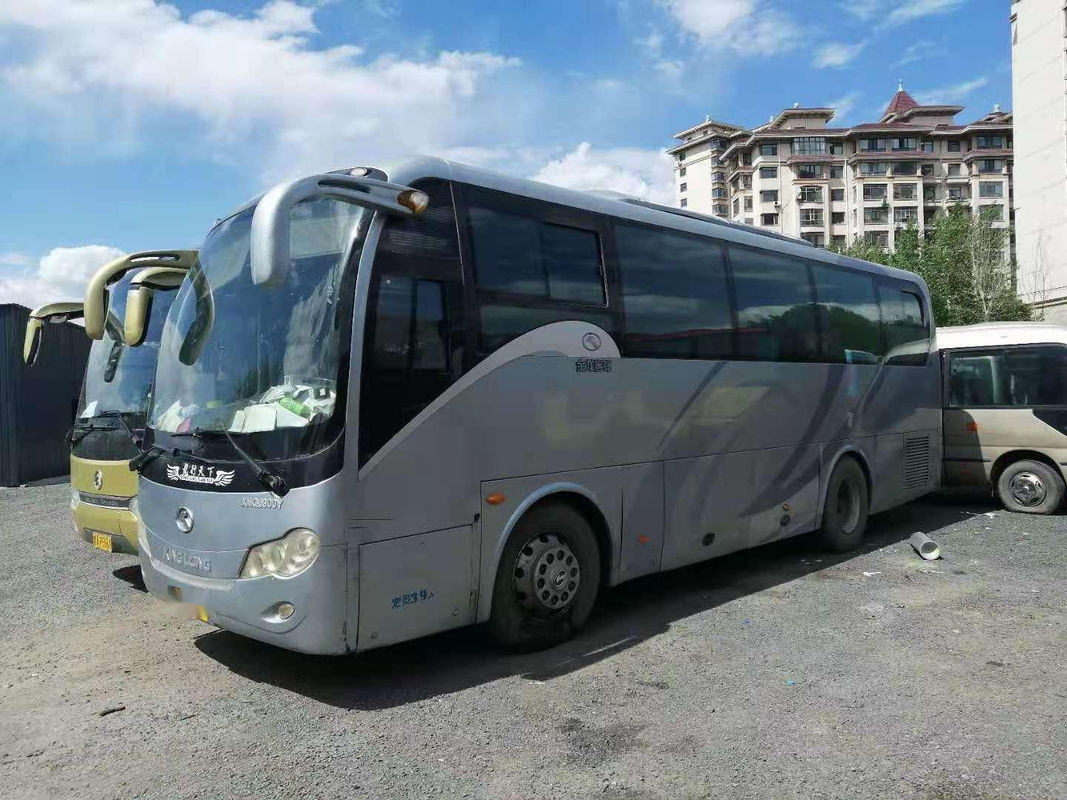 ステアリング鋼鉄シャーシを残っている使用されたKinglongバスXMQ6900両開きドア39seatsの低いキロメートル